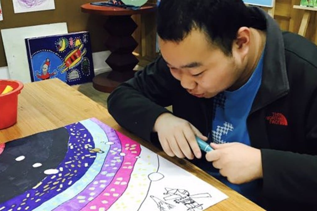 A member attends a free art class at a World of Art Brut Culture centre. Photo: Handout