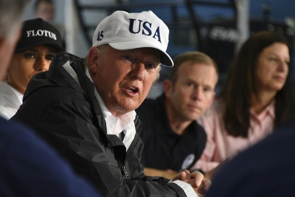 US President Donald Trump receives a briefing on Hurricane Harvey at a fire station in Corpus Christi, Texas, on Tuesday. Photo: EPA/Handout