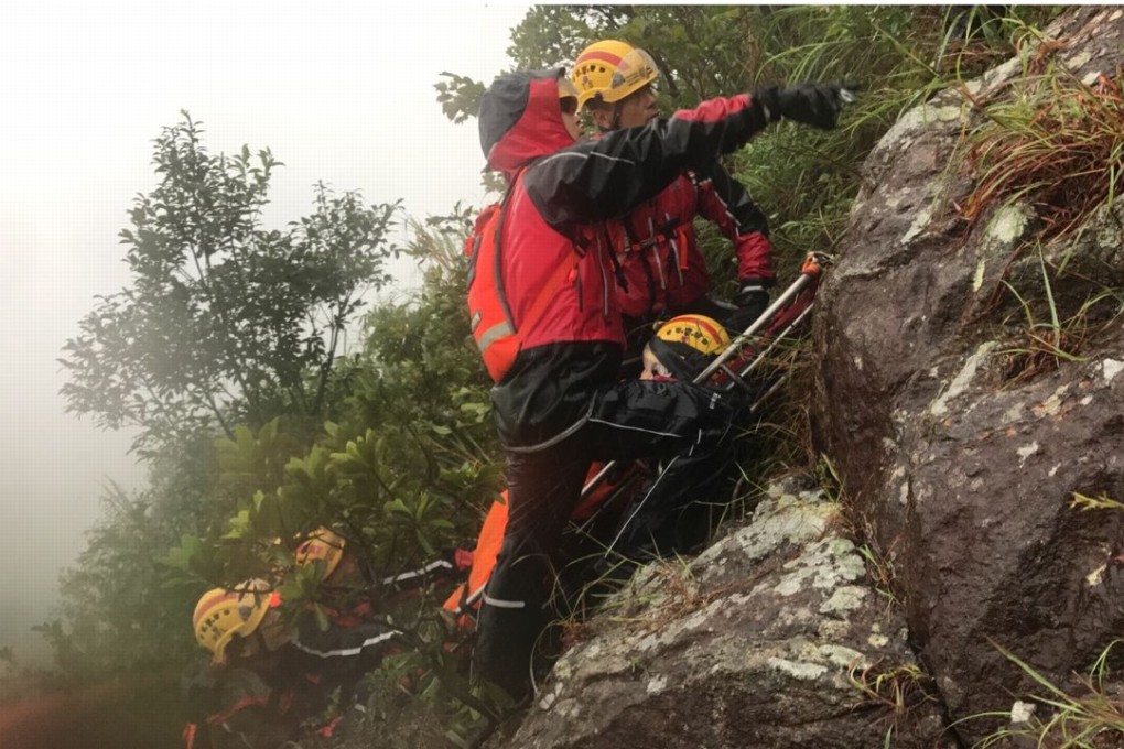 Hikers rescued on Kowloon Peak jeopardised the safety of 160 firefighters and cost badly needed resources. Photo: Handout