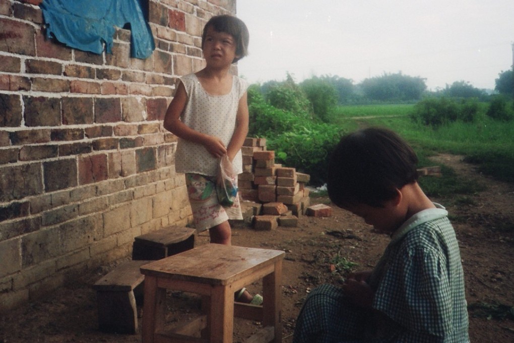 Children live with poverty in Hua Tong Village in the mountainous northeast region of Guangdong.