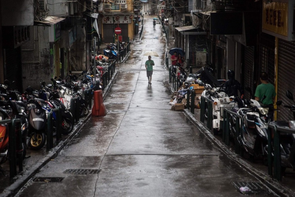 Shops shuttered, and deserved streets as Pakhar passes over Hong Kong and Macau on August 27. PHOTO / DALE DE LA REY