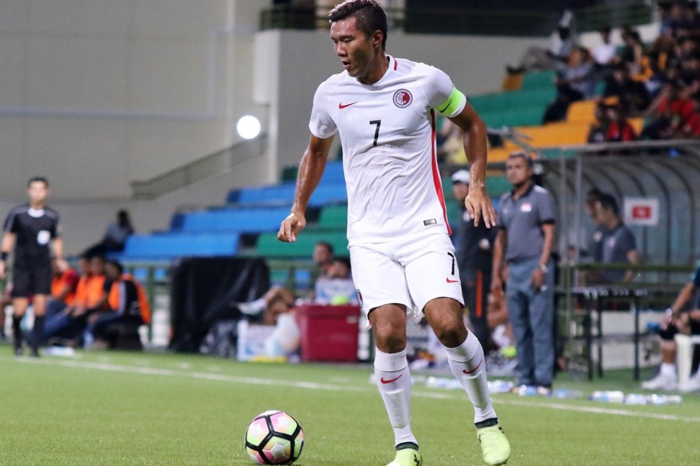 Chan Siu-ki is on the ball for Hong Kong in Singapore. Photos: Handout
