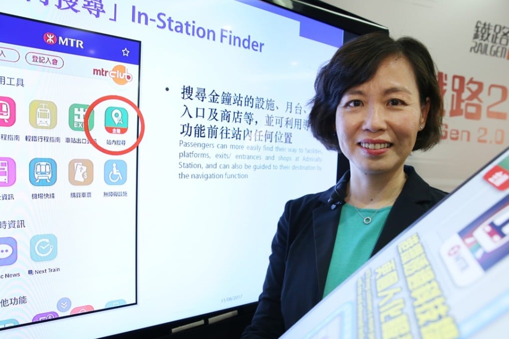 Commercial director of MTR Corporation Jeny Yeung Mei-chun demonstrates the newl features of the app. Photo: Sam Tsang
