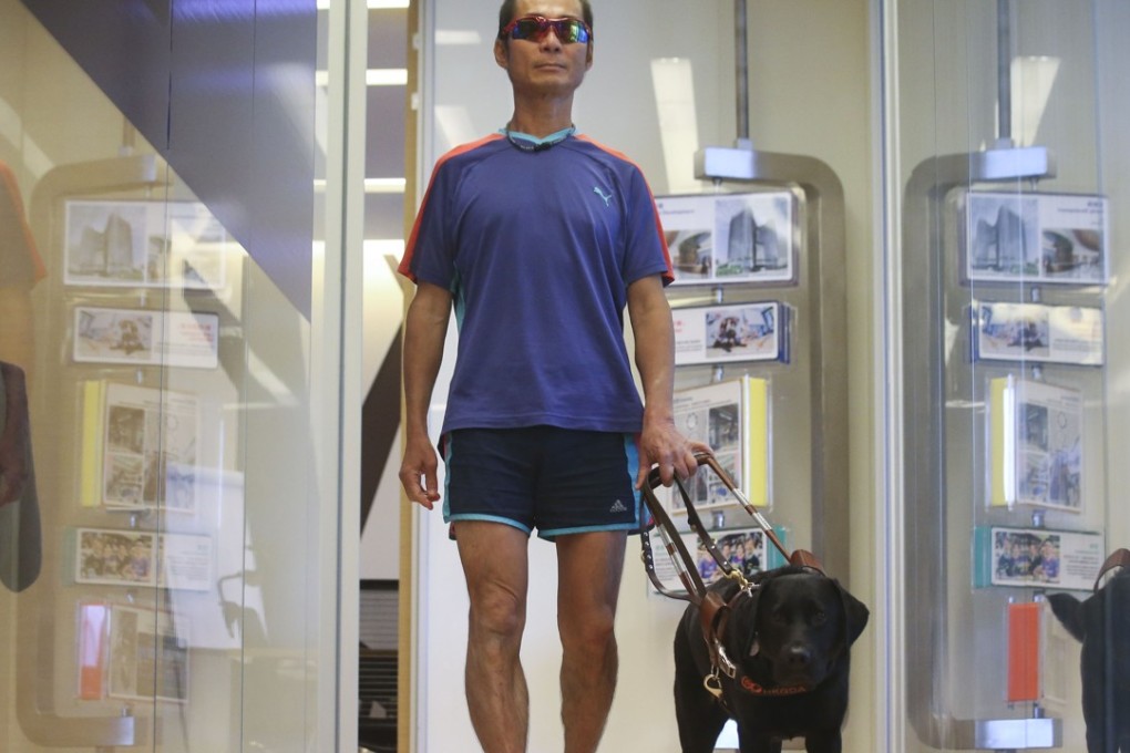 Blind athlete Gary Leung says owning a guide dog has greatly improved his standard of living. Photo: K. Y. Cheng