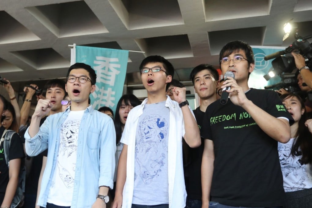 Pro-democracy activists (from left) Nathan Law, Joshua Wong and Alex Chow ahead of their sentencing, at the High Court on August 17. Photo: Edward Wong