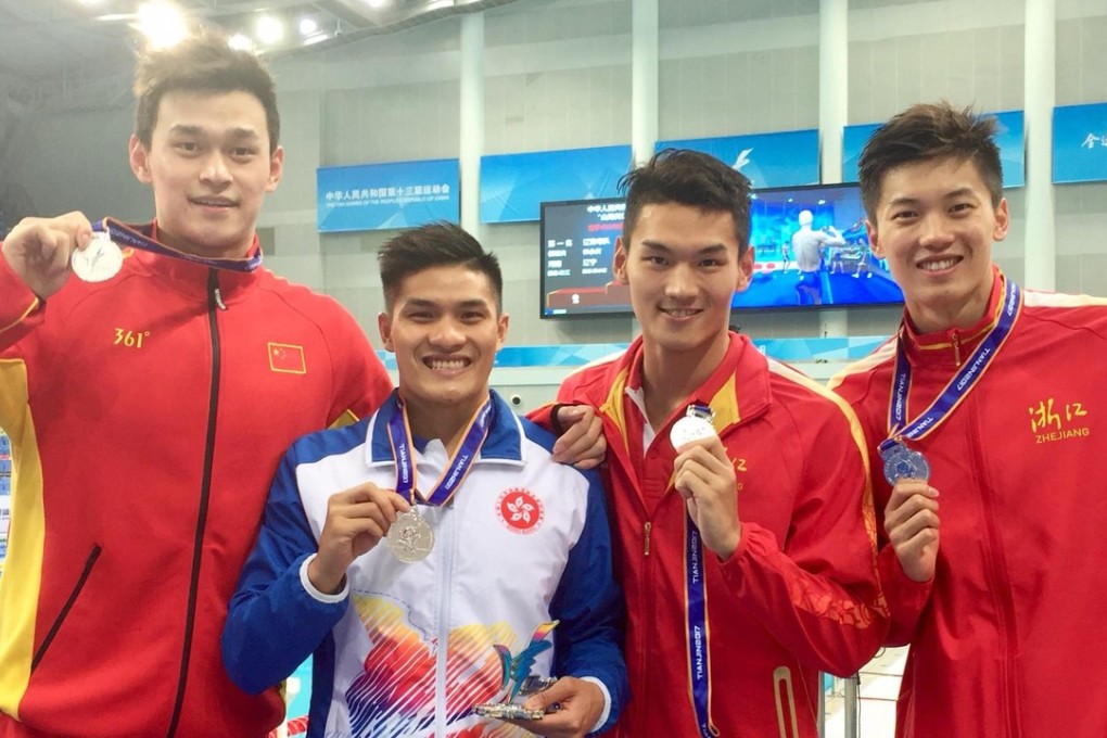 Kenneth To King-him with Sun Yang (left) and the other Zhejiang swimmers, Wang Shun and Xu Jiayu. Photo: Facebook / Kenneth To
