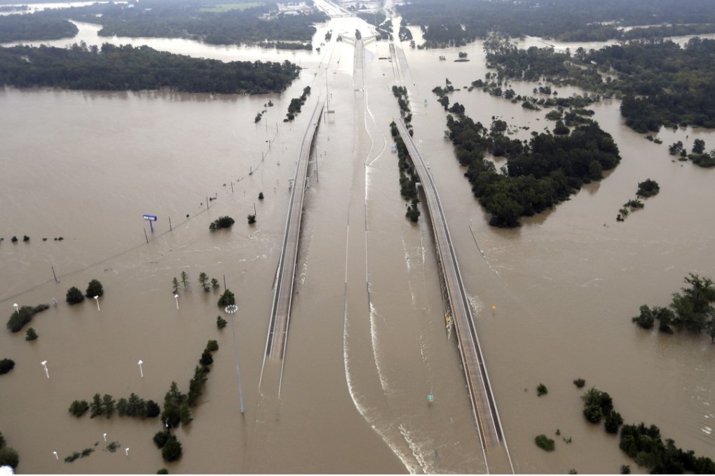 Interstate 69 is covered by floodwaters from Harvey, in Humble, Texas. Photo: AP