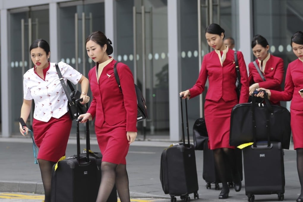 Cathay Pacific Airways is holding a vote among its Hong Kong-based cabin crew over extending the retirement age limit. Photo: Edward Wong