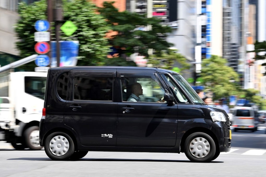 A kei, or light car in Japanese, in the the Ginza shopping district in Tokyo. Photo: AFP