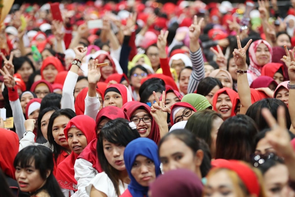 Indonesian domestic helpers are banned from working in the mainland despite the growing demand for their services. Photo: SCMP