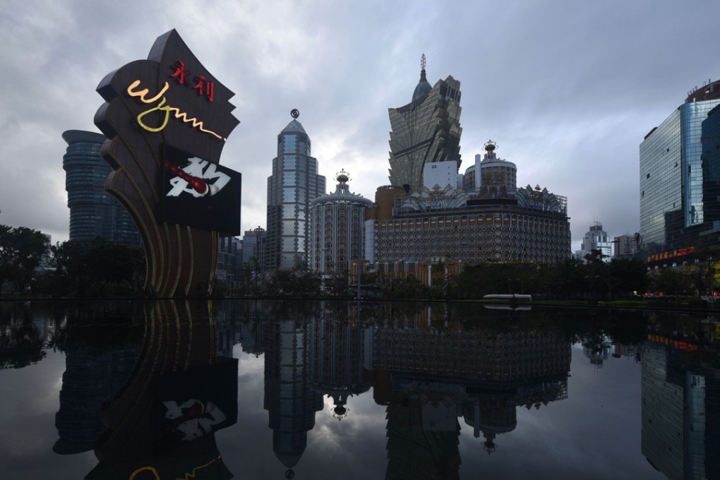 A general view shows casino hotels and some broken windows of the Paradise Kam Pek Casino (R) in Macau on August 24, 2017, a day after Typhoon Hato hit the territory. Photo: AFP