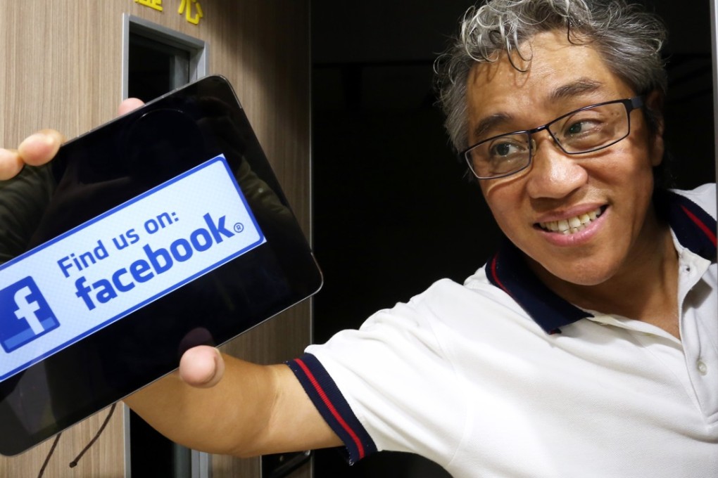 Reverend Woody Chung sent out a sermon over WhatsApp when his Sunday service was cancelled because of the typhoon. Photo: Jonathan Wong