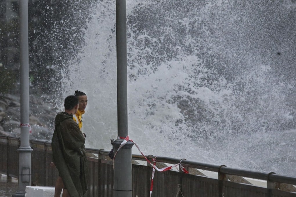 People watch strong waves at Heng Fa Chuen as Typhoon Pakhar hits Hong Kong Photo: Dickson Lee