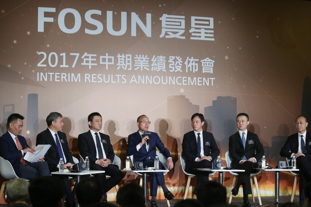 Fosun’s top management at its 2017 interim results presentation in Hong Kong last month. The company has faced scrutiny from mainland authorities over its aggressive overseas acquisitions. Photo: K.Y. Cheng