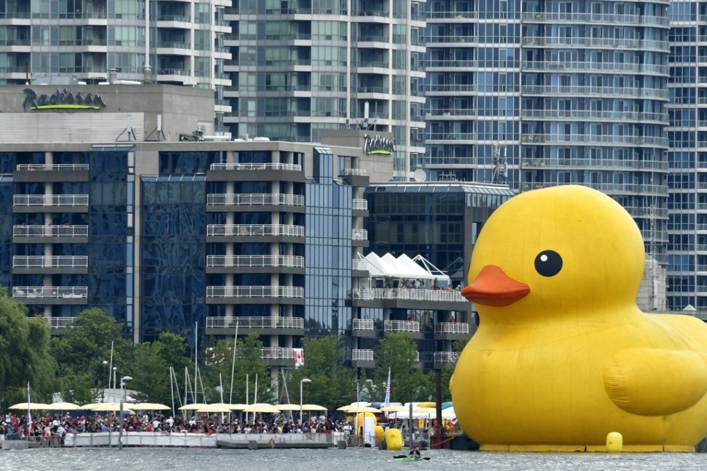 A 19-metre-tall (61-foot-tall) rubber duck floats in Toronto Harbour n Toronto, Canada, 01 July, 2017. The duck was in the city as part of the celebrations to mark Canada's 150th birthday. Toronto is Canada's largest city with a population of about 2.8 million people. Photo: EPA