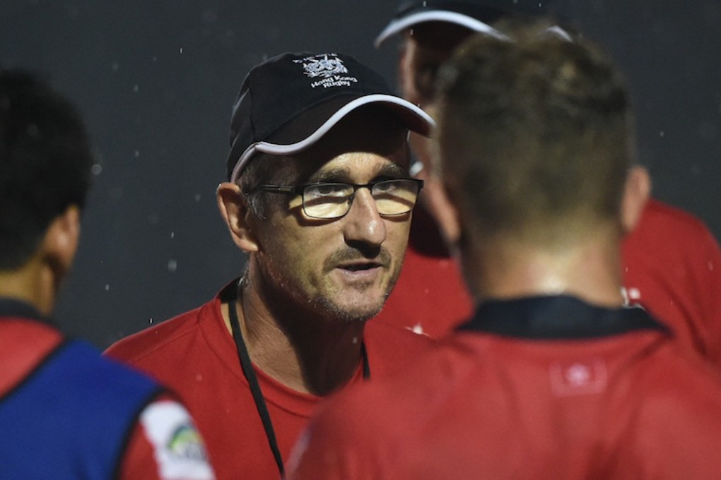 Hong Kong coach Paul John addresses his side during the Asia Rugby Sevens Series on the weekend. Photo: HKRU