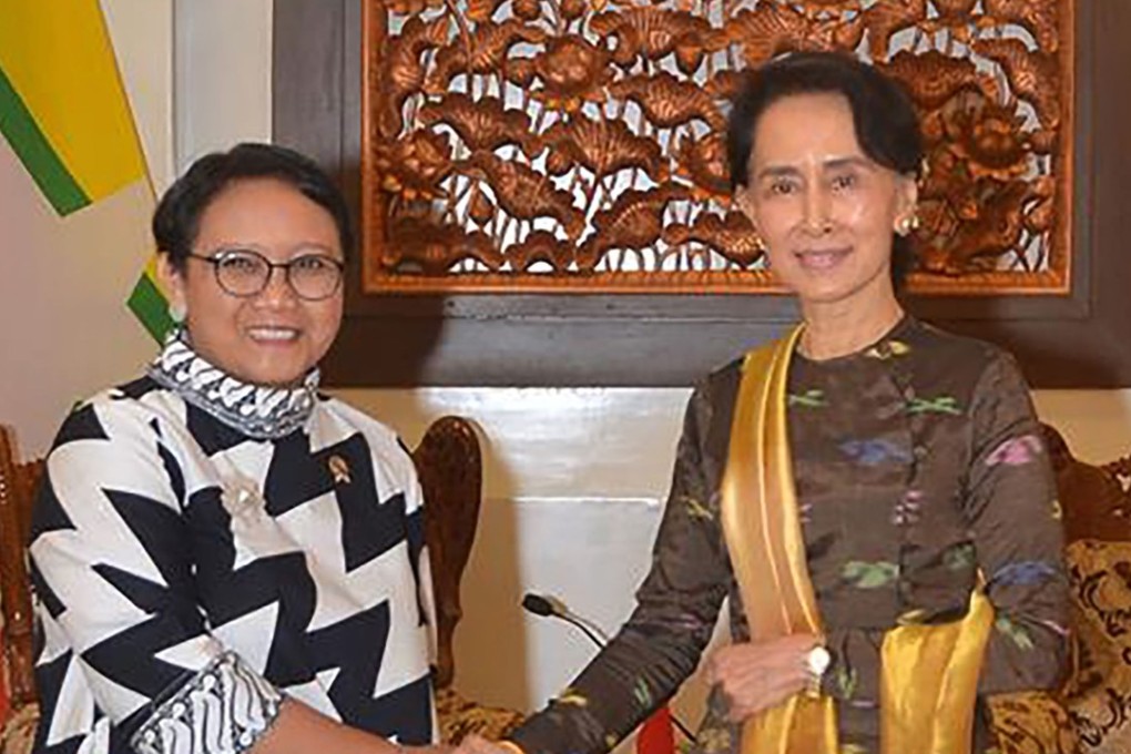 Indonesian Foreign Minister Retno Marsudi shaking hands with Myanmar’s State Counsellor Aung San Suu Kyi in Naypyidaw. Photo: AFP