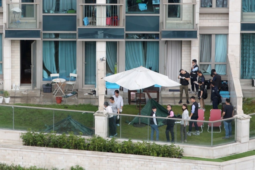 The couple fell down onto the patios of fifth-floor flats. Photo: Sam Tsang