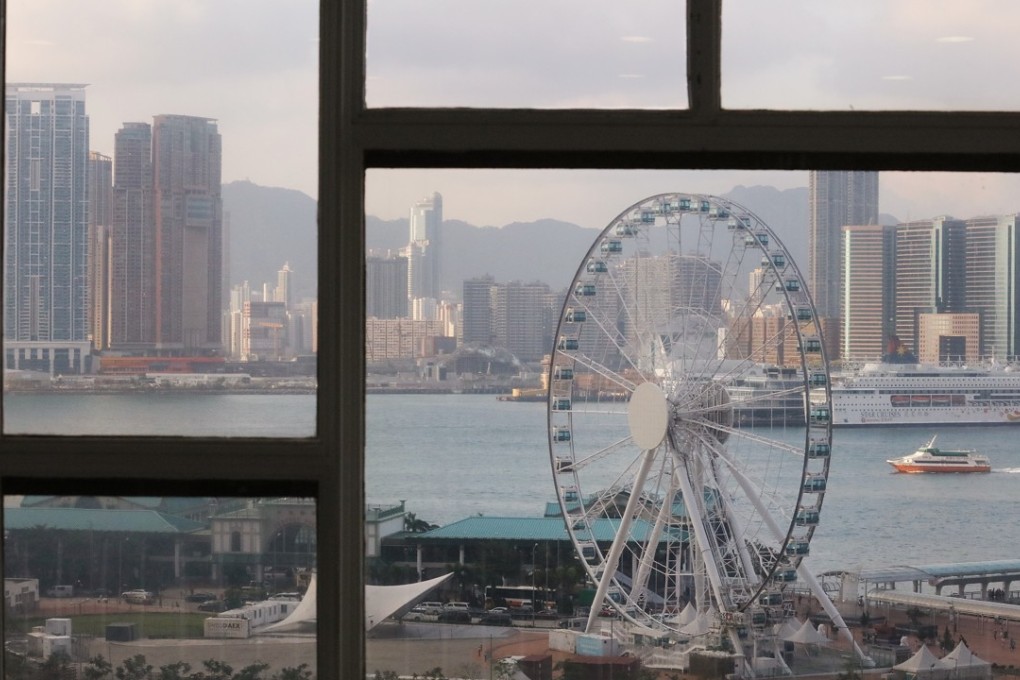 On Monday night, the government threatened to seize the land on which the wheel sits. But on Tuesday, Carrie Lam struck a more diplomatic tone. Photo: Felix Wong