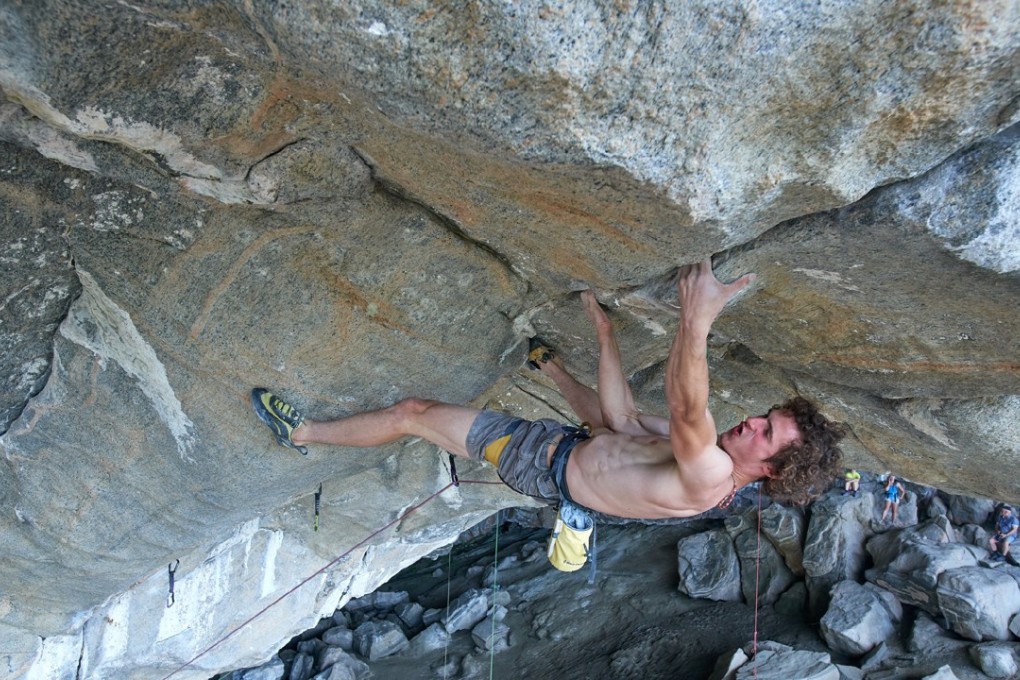 Czech climber Adam Ondra upside down in the Hanshelleren cave, Flatanger, Norway, ahead of Monday’s successful climb. Photo: Montura