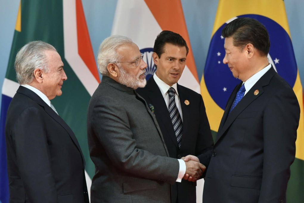 Chinese President Xi Jinping (right) pictured with Indian Prime Minister Narendra Modi (second left) at the BRICS nations summit in Xiamen in China. Photo: Xinhua