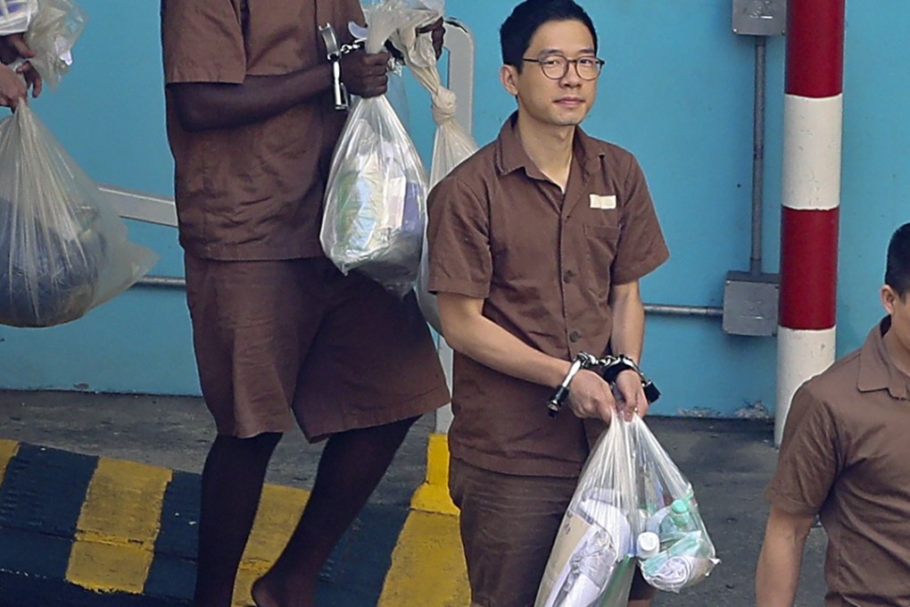 Nathan Law being escorted away from Lai Chi Kok Reception Centre to serve his jail sentence. Photo: Handout