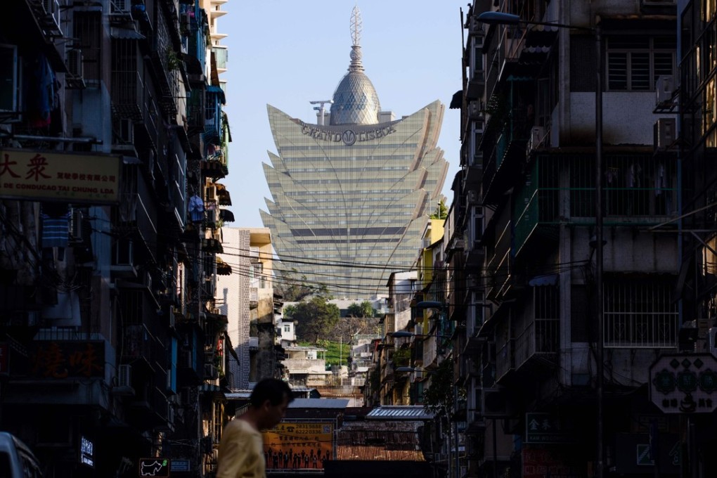 Macau’s casinos are likely to report a dip in earnings for the third quarter following a week of bad storms in late August. Photo: AFP