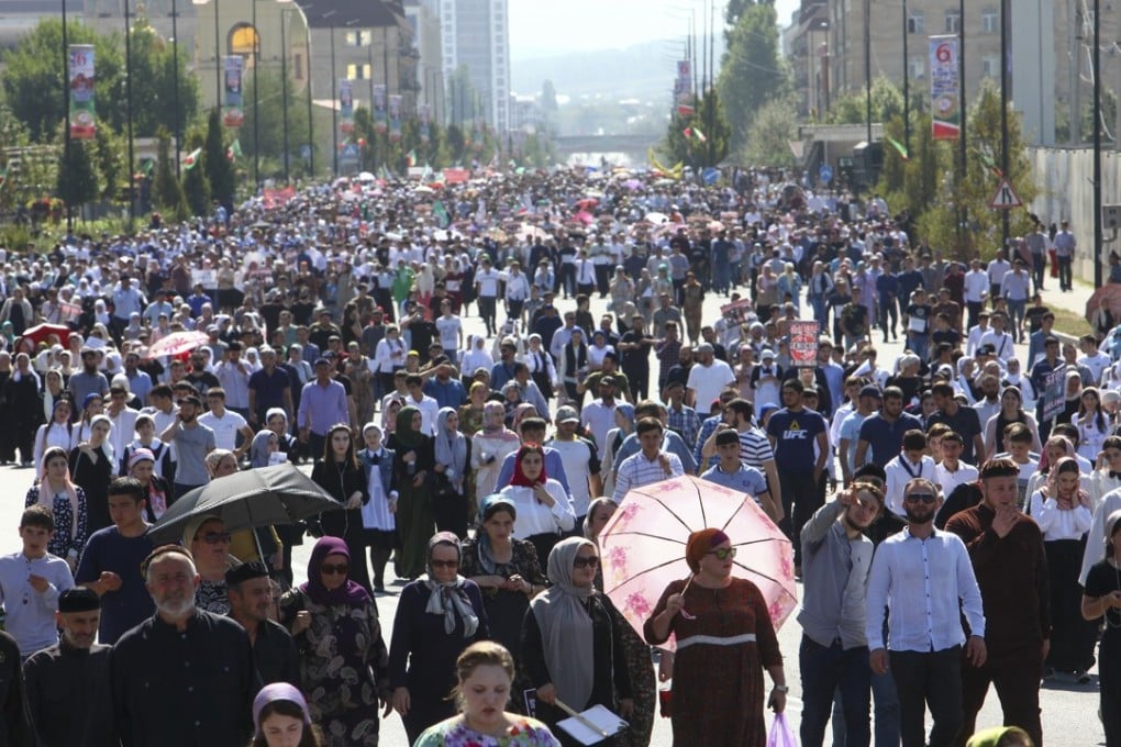 Chechens attend a mass protest in Grozny on Monday to protest against the treatment of the Rohingya minority in Myanmar. Photo: AP
