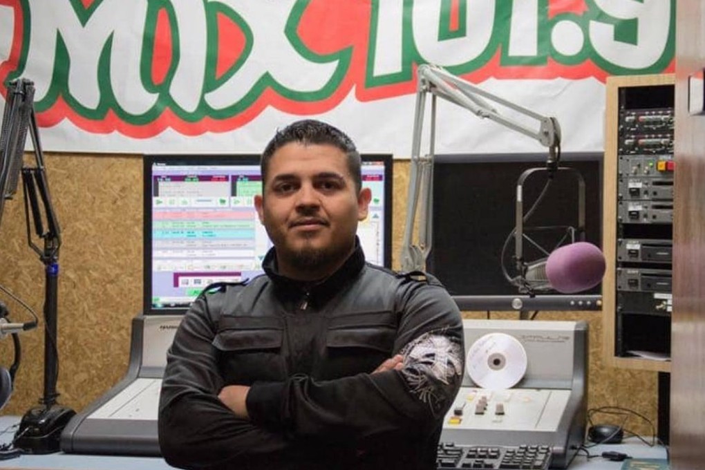 Alonso Guillen is pictured at his job as a radio host in Lufkin, Texas. He died trying to rescue victims of flooding in Houston. Photo: Courtesy of Jesus Guillen