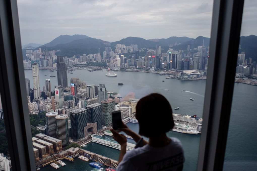 Hong Kong lags behind other cities like Singapore and Taiwan in terms of livability for expatriates. AFP Photo / Anthony Wallace