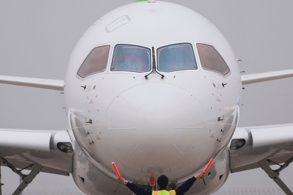 China's home-grown C919 passenger jet after landing from its maiden flight, at Pudong International Airport in Shanghai in May this year. Photo: AFP