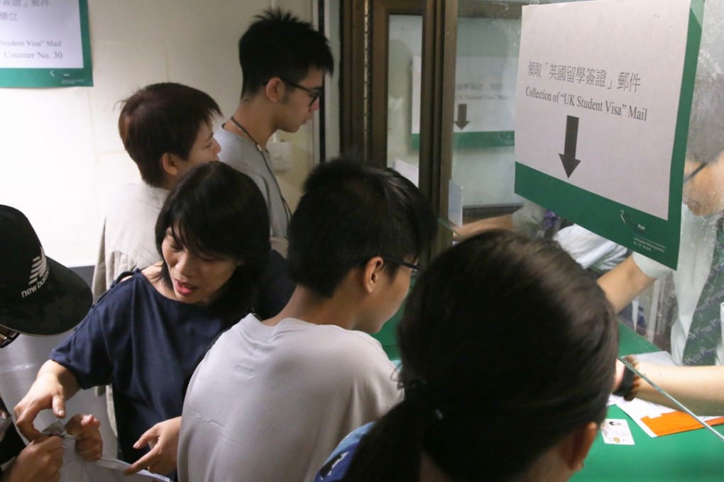 Students collecting their British visas at the UK’s application centre in Causeway Bay on Wednesday. Photo: Sam Tsang