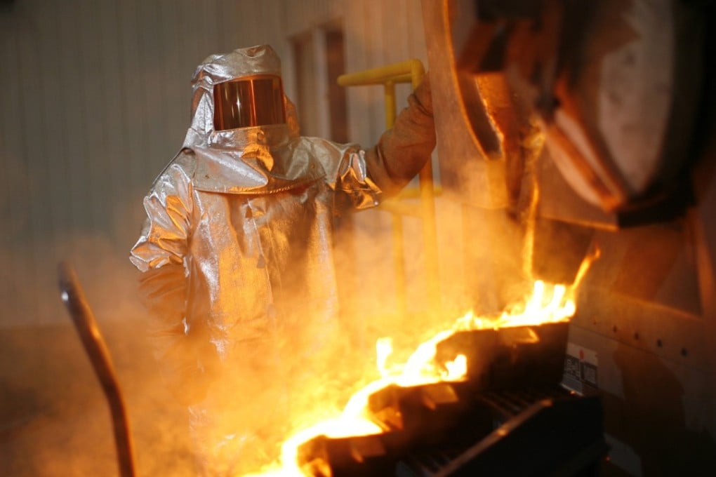 Gold is poured at a mine in Canada. China Investment Corp has unloaded half of its stake in Canada’s most diversified miner, Teck Resources. Photo: Reuters