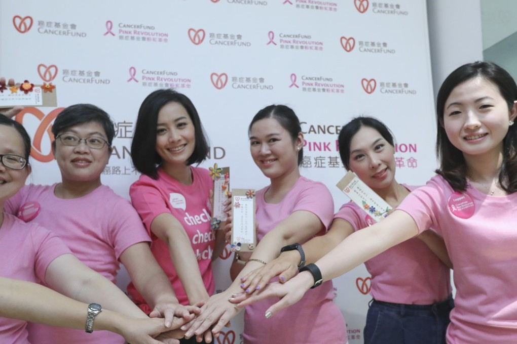 Fala Chen (third left), an ambassador of Cancer Fund Pink Revolution, with breast cancer survivors and volunteers at the Cancer Fund CancerLink Support Centre in Central, in July last year. Photo: SCMP Pictures