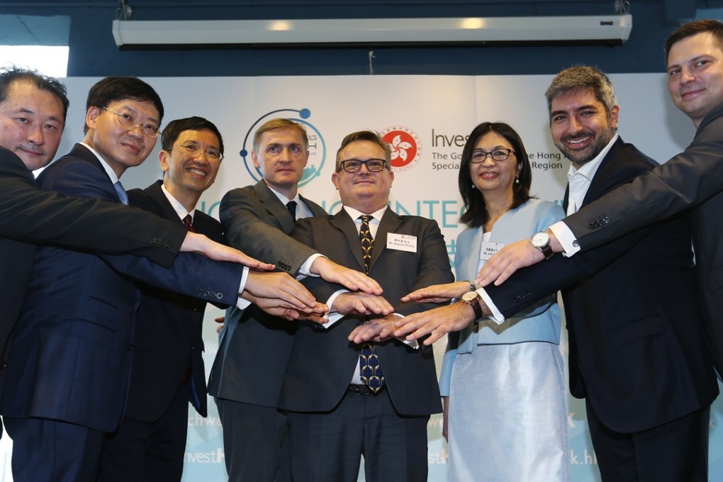 From left: Juwan Lee, founder and CEO of NexChange; Li Shu-pui, executive director of Hong Kong Monetary Authority; John Leung Chi-yan, CEO of Insurance Authority; Charles d’Haussy, head of fintech, InvestHK; Stephen Philips, director-general of investment promotion, InvestHK; Julia Leung, executive director of intermediaries division, Securities and Futures Commission; Henri Arslanian, member of the temporary board, Fintech Association of Hong Kong and Anthony Sar, CEO and founder, Finnovasia, at the InvestHK media briefing on the fintech market. Photo: Xiaomei Chen