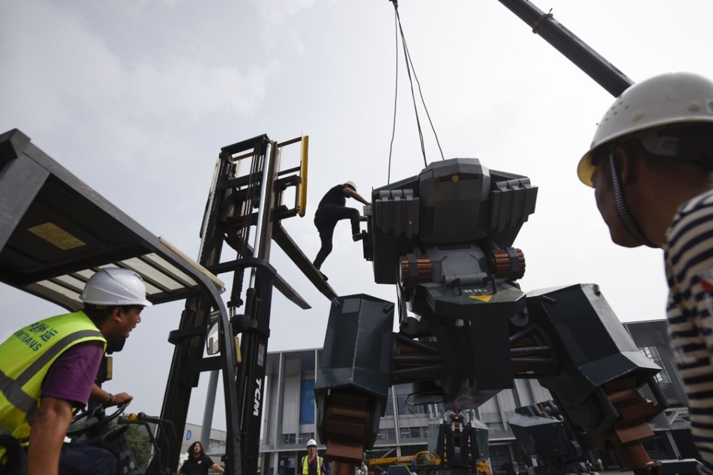 One of Sun’s creation is assembled outside a robotics conference in Beijing. Photo: AFP