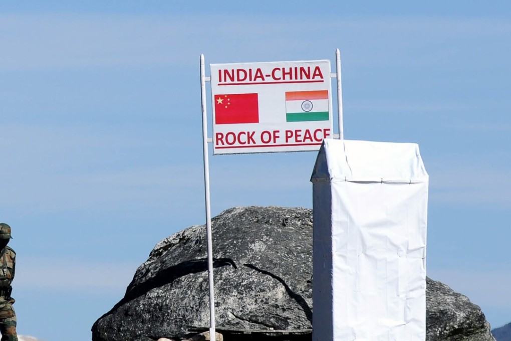 An Indian soldier keeps watch at Bumla Pass on the India-China border in Arunachal Pradesh. File photo: AFP