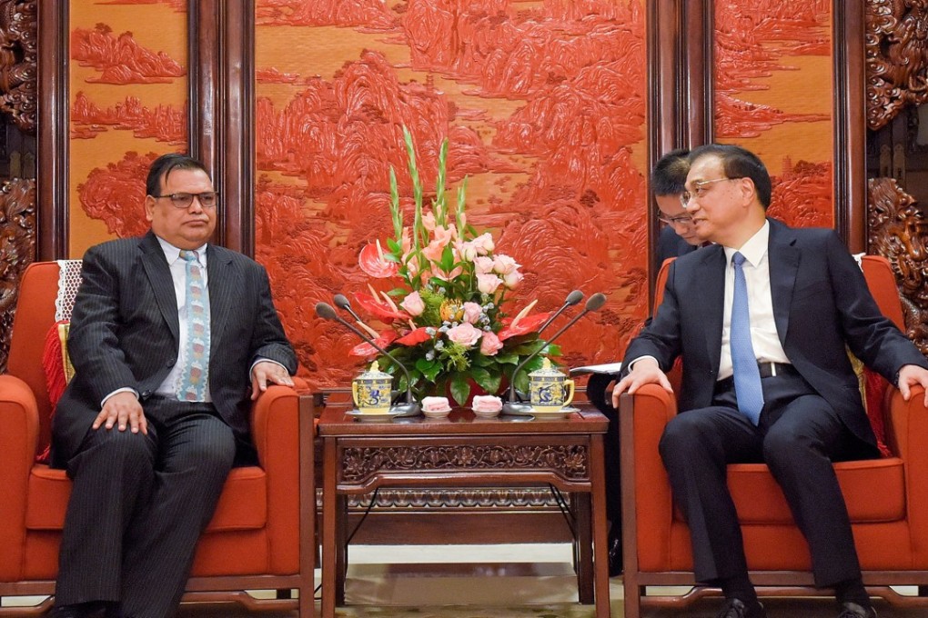 Deputy Prime Minister of Nepal Krishna Bahadur Mahara meets Chinese Premier Li Keqiang in Beijing on Thursday. Photo: Reuters