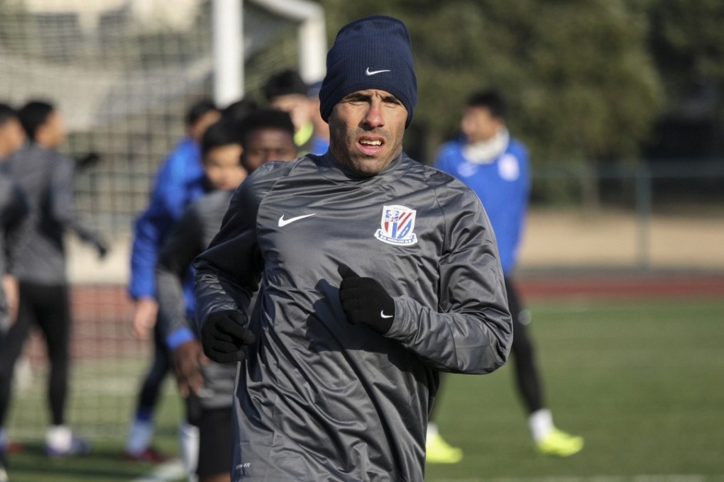 Argentine striker Carlos Tevez kept his word and returned to China following a visit home to deal with an injury. Photo: AFP