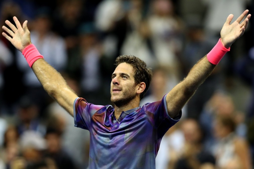 Juan Martin del Potro of Argentina celebrates after defeating Roger Federer of Switzerland in the US Open quarter-finals. Photo: EPA