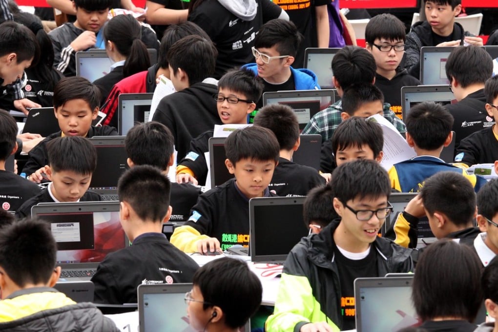 Youngsters attend the Cyberport Youth Coding Jam 1000 in Tamar in April, 2015. Coding should be introduced into primary and secondary schools’ curriculums as soon as possible. Photo: May Tse