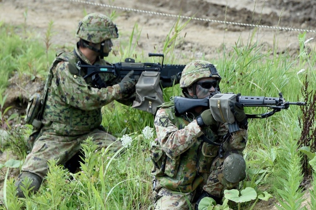 Soldiers from the Japanese Self-Defence Forces take part in a field drill with US Marines in Hokkaido. Photo: AFP