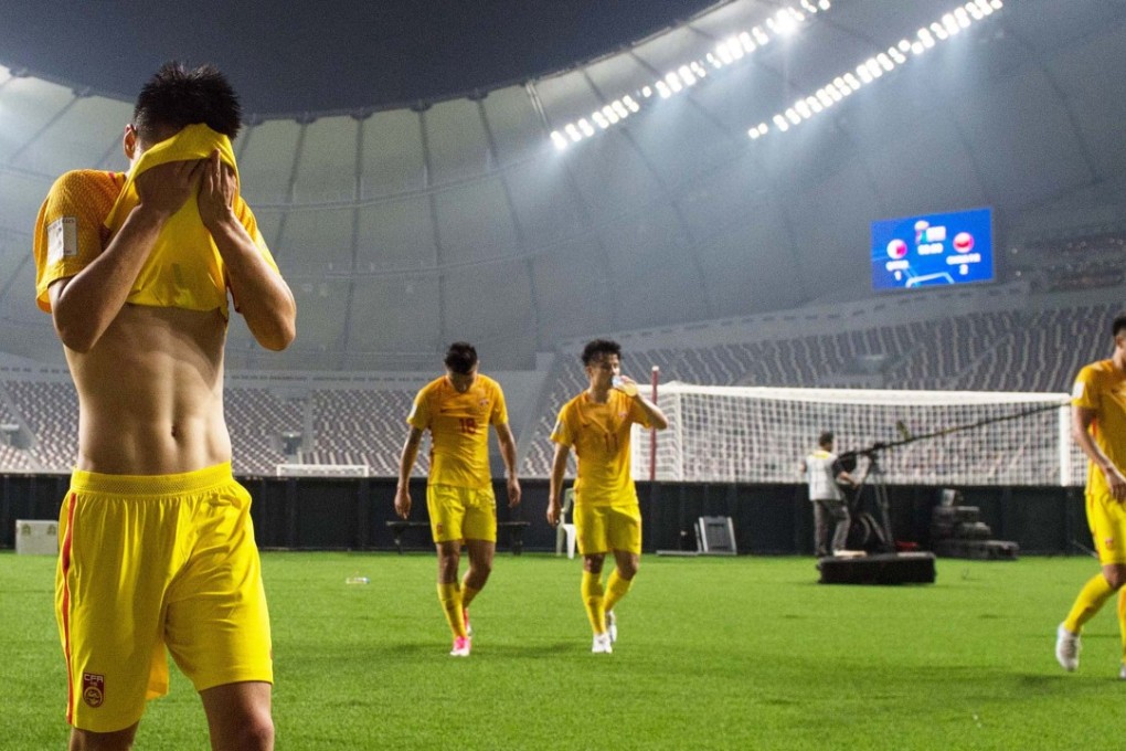 China players leave the field after beating Qatar, but the bad start to their World Cup campaign gave them too much to do. (Xinhua/Meng Tao)