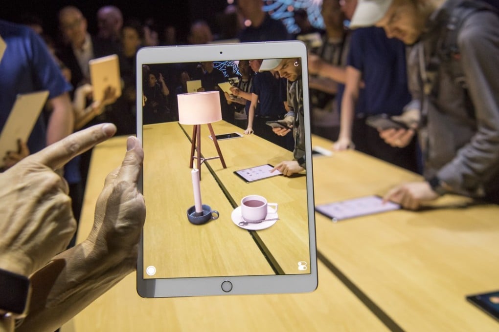Among its many possible uses, the ARKit augmented reality tool kit could be used to build software that helps customers visualise how new furniture would look in their homes. Photo: Bloomberg