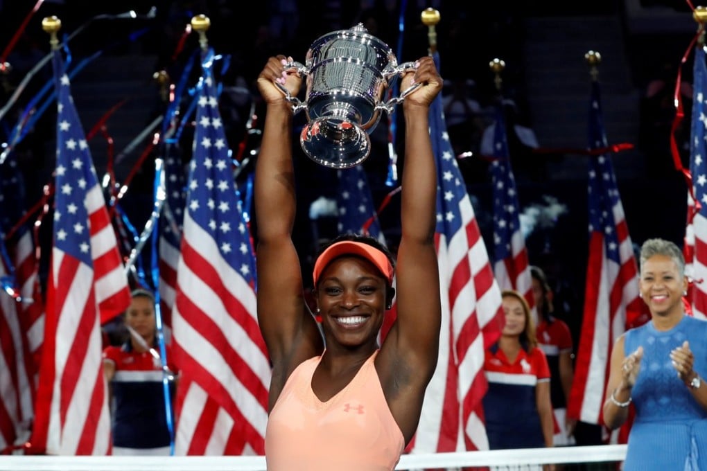Sloane Stephens of the United States reacts with trophy after defeating Madison Keys in the US Open final. Photo: Reuters