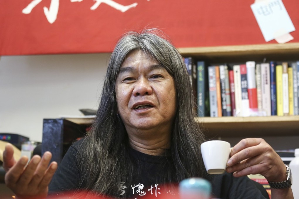 Former Hong Kong lawmaker ‘Long Hair’ Leung Kwok-hung at his office in Tamar in July. Photo: Jonathan Wong