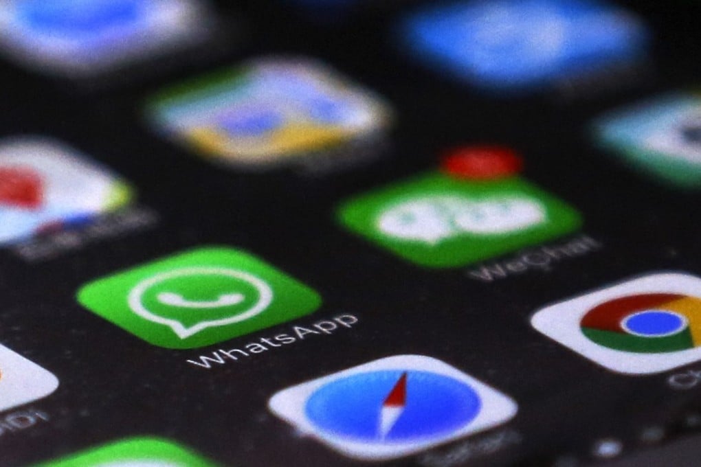 WhatsApp is seen with other mobile apps on a smartphone in Beijing. Photo: AP/Andy Wong