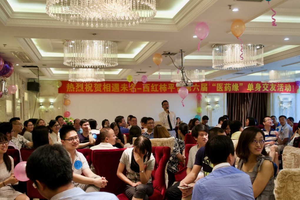 Young singles participate in a matchmaking event for graduates of top universities. Photo: Tom Wang