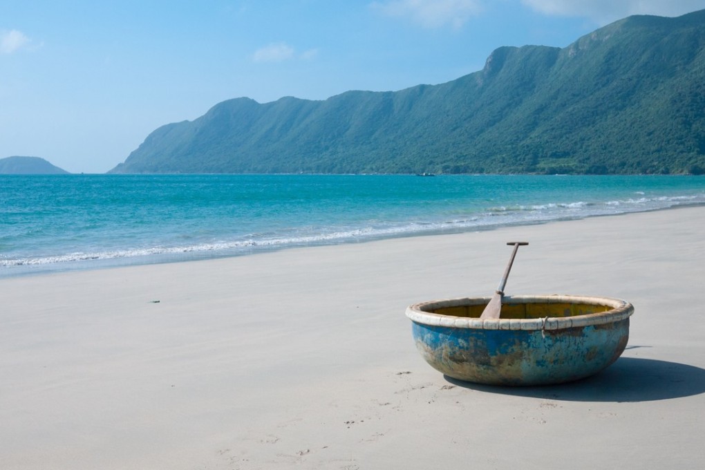 A coracle sits on An Hai Beach on Con Son Island, part of Vietnam’s stunning Con Dao archipelago. Photo: Alamy