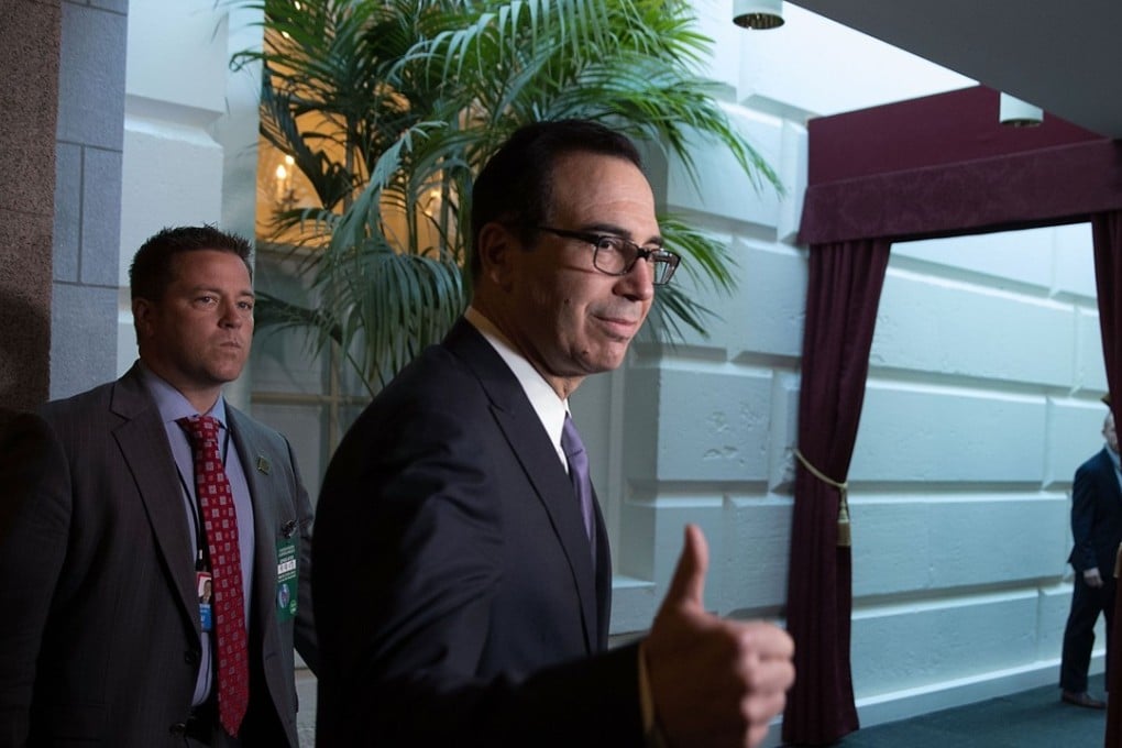 US Treasury Secretary Steven Mnuchin gives a thumbs up as he arrives at a House Republican Conference meeting at the Capitol in Washington. Mnuchin was on the Hill to push for the Trump Administration's Hurricane Harvey relief and debt limit package. Photo: AFP